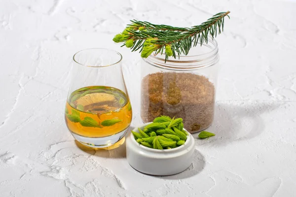 Spruce tips syrup or liqueur. Healthy eating concept.