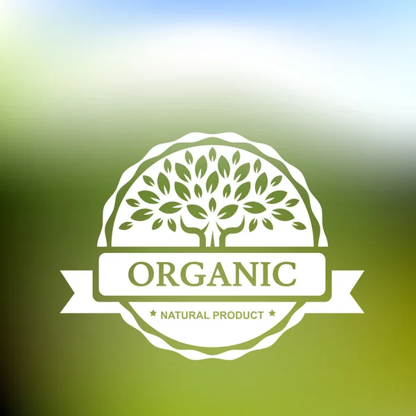 Organic product badge with tree on blurred landscape. Vector ill - Stok Vektor