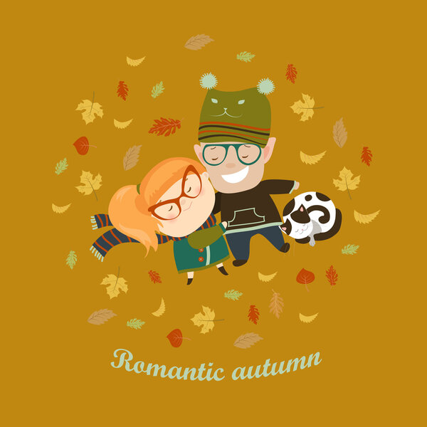 Romantic couple lying on grass among the fallen leaves
