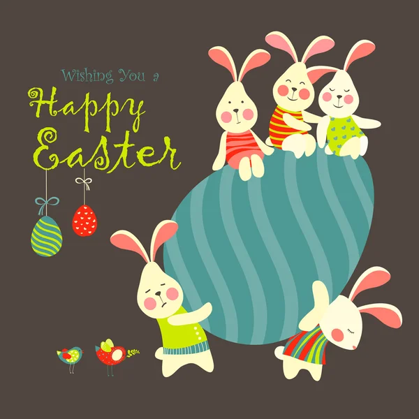 Easter bunnies and easter egg — Stock Vector
