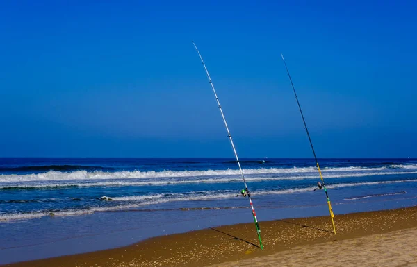 Fishing rods on the beach Stock Photos, Royalty Free Fishing rods