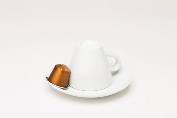 Coffee cup with capsule — Stock Photo, Image