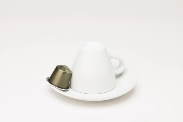 Coffee cup with capsule — Stock Photo, Image