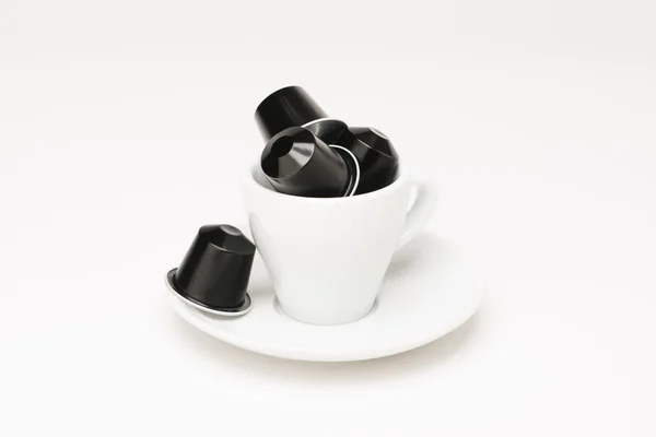 Coffee cup with capsule — Stock Photo, Image