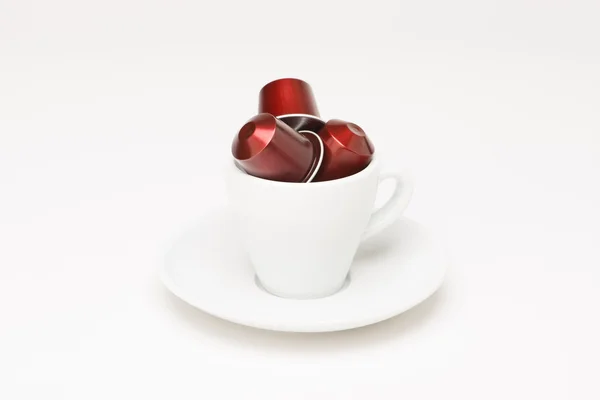 Coffee cup with capsule — Stock Photo, Image