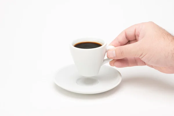 Cup of coffee with hand — Stock Photo, Image