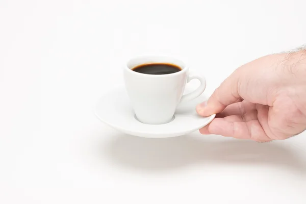 Cup of coffee with hand — Stock Photo, Image