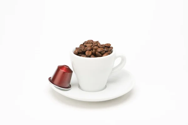 Seed of coffee with capsule — Stock Photo, Image