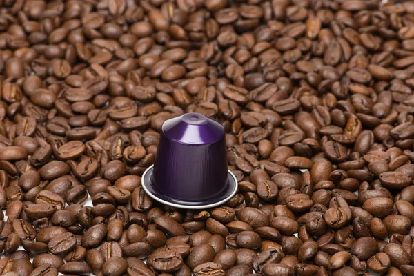 Seed of coffee with capsule — Stock Photo, Image