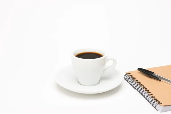 Tazza di caffè con taccuino — Foto Stock