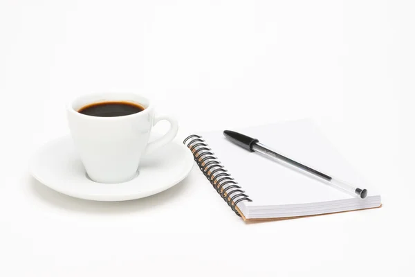 Taza de café con cuaderno — Foto de Stock