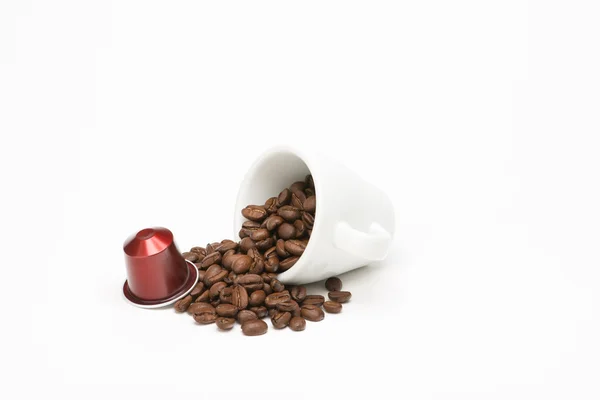 Seed of coffee with capsule — Stock Photo, Image