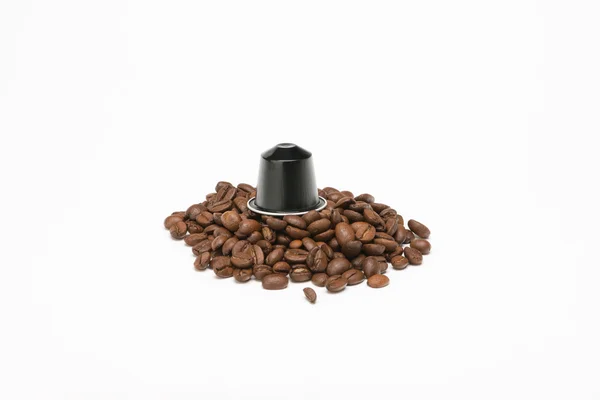 Seed of coffee with capsule — Stock Photo, Image