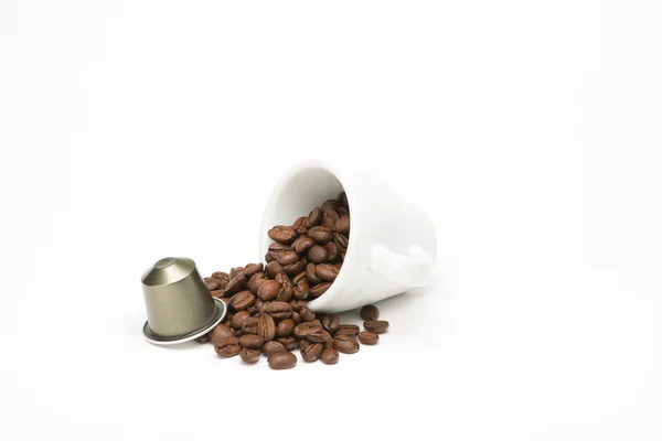 Seed of coffee with capsule — Stock Photo, Image