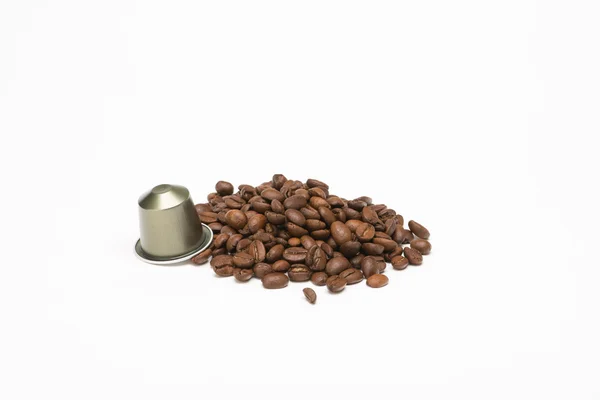 Seed of coffee with capsule — Stock Photo, Image