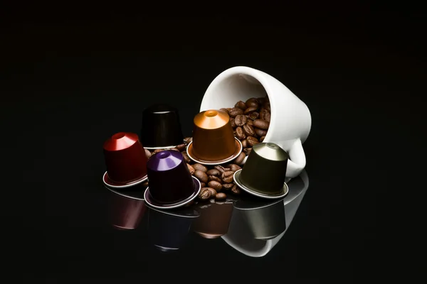 Bean's coffee cup with capsule — Stock Photo, Image