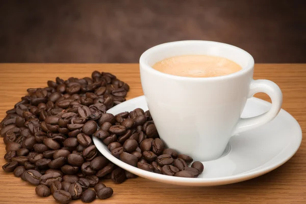 Coffee's cup with bean — Stock Photo, Image