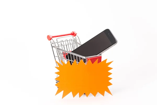 Caddy para ir de compras con smartphone — Foto de Stock