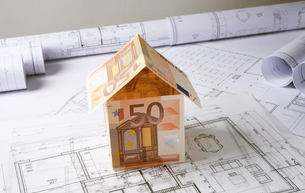 Architecture plans with money house — Stock Photo, Image