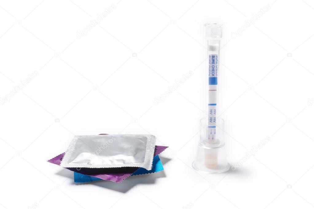 HIV test with condom isolated on white background