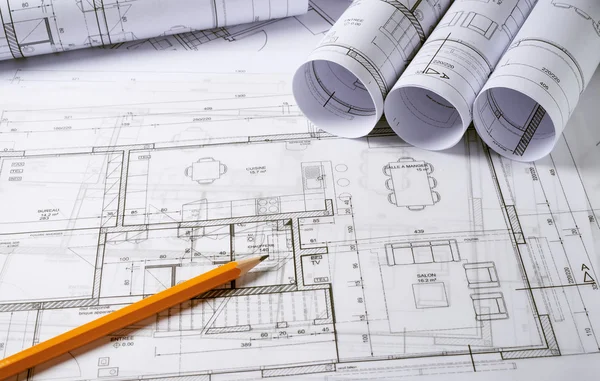 Architecture plans with pencil Stock Image