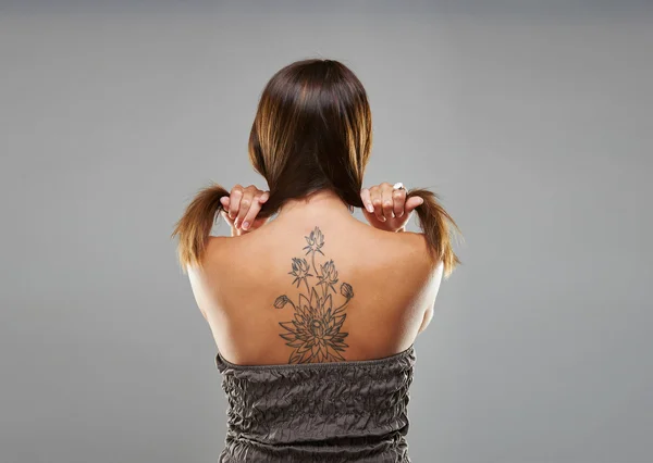Tattoo woman portrait in studio shoot — Stock Photo, Image