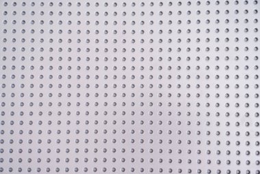 Nokta deseni. Puantiyeli arka plan. Polka soyut bir arkaplan. Panorama manzaralı. Seçici odaklanma. Doku.