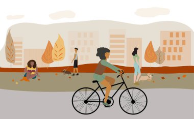 İnsanlar sonbahar arka planında parkta çeşitli aktiviteler yapıyorlar..