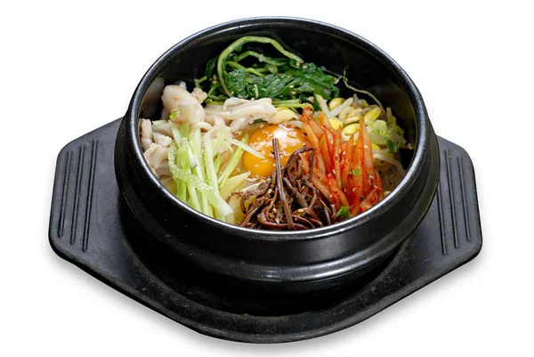 Bibimbap: Canlı sebze, protein ve aromalı soslu geleneksel Kore pirinç yemeği. Tatmin edici ve renkli bir mutfak zevki..