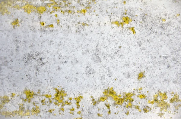 Yellow-gray abstract background. Corroded metal background. Oxidized metal, rusty metal texture, surface with rust veins and scratches, tinted. Soft focus.