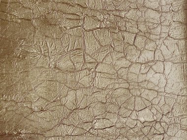 Arka plan olarak bronz doku ya da tasarım elementi, duvarda şişmiş eski boya, pürüzsüz desen