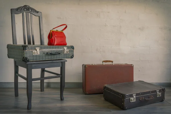Old suitcases and red bag — Stock Photo, Image