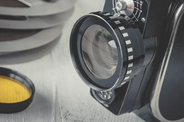 Old movie camera and film reel — Stock Photo, Image