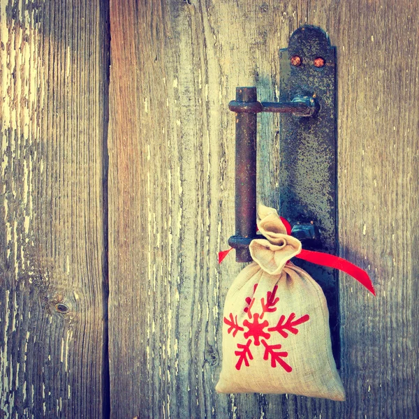 Gift on the handle of door — Stock Photo, Image