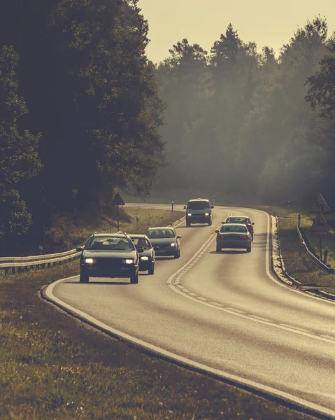 Cars in the morning highway — Stock Photo, Image