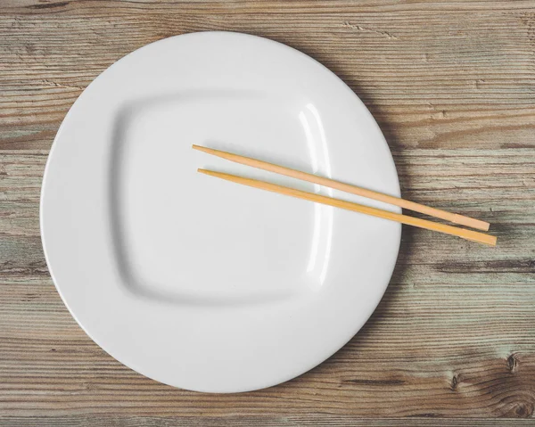 White plate and chopsticks for sushi — Stock Photo, Image