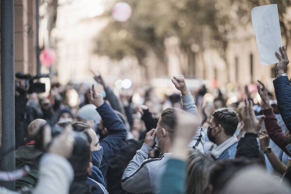 spain, palma de mallorca - january 12, 2021: people are in the street demonstrating against the new restrictions applied by president armengol