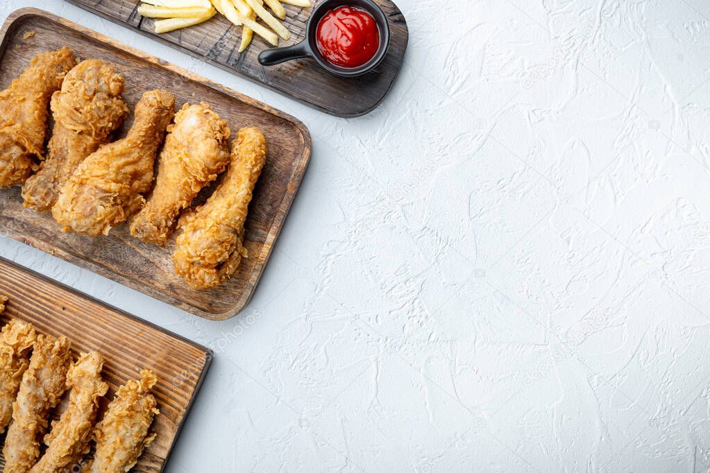 Southern fried chicken cuts on white background, top view, with space for text.