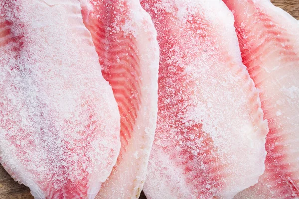Bevroren Rauw Tilapia Visvlees Witte Achtergrond Bovenaanzicht — Stockfoto