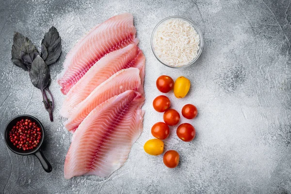 Witte Vis Filet Met Basmatirijst Kerstomaten Ingrediënten Grijze Achtergrond Bovenaanzicht — Stockfoto