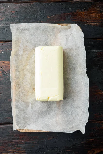 Pedaço Manteiga Fresca Fundo Velho Mesa Madeira Escura Vista Superior — Fotografia de Stock