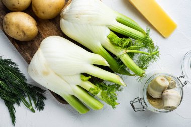 Taze floran rezene ampulü, beyaz desenli arka planda, düz yerde.