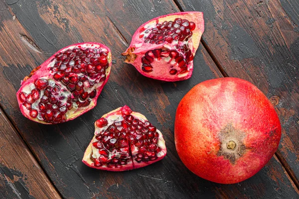 Cuts Pomegranate Old Dark Wooden Table Side View Selective Focus — Stock Photo, Image
