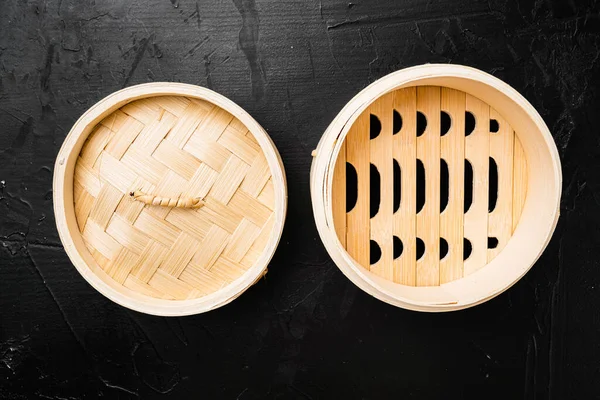 Bambu buhar seti, metin ya da yiyecek için kopyalama alanı, metin ya da yiyecek için kopyalama alanı ile, üst görünüm düz, siyah taş masa arkaplanı üzerinde