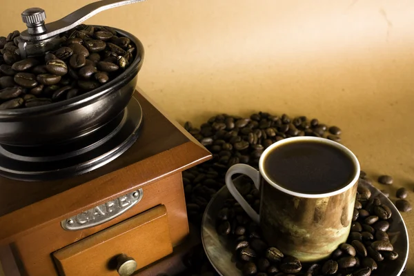 Coffee cup with beans — Stock Photo, Image