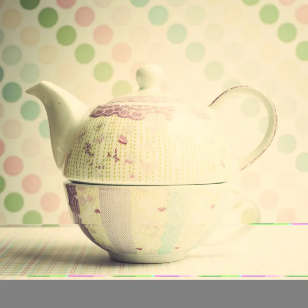 Vintage teapot and cup — Stock Photo, Image