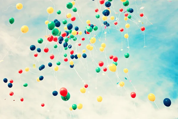 Balloons over a retro sky — Stock Photo, Image