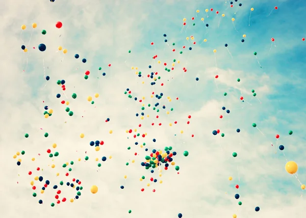 Balloons over a retro sky — Stock Photo, Image