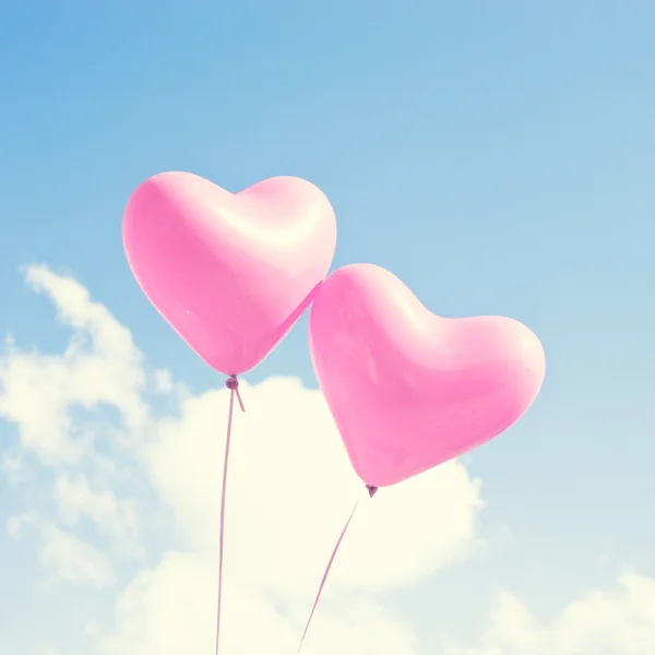 heart balloons in the sky