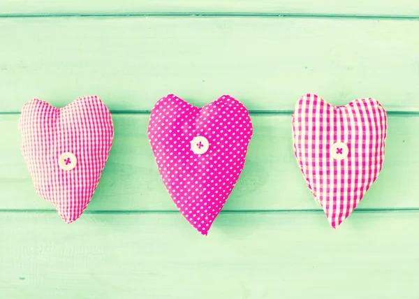 Vintage patterned sewn hearts — Stock Photo, Image